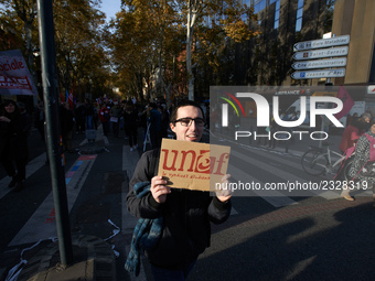 A student holds a placrd for the students' union, UNEF. More than 4000 protesters took to the streets of Toulouse against the new Macron's r...