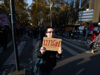 A student holds a placrd for the students' union, UNEF. More than 4000 protesters took to the streets of Toulouse against the new Macron's r...