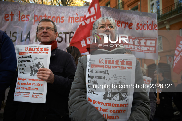 People selling far-left newspapers during the demonstration. More than 4000 protesters took to the streets of Toulouse against the new Macro...