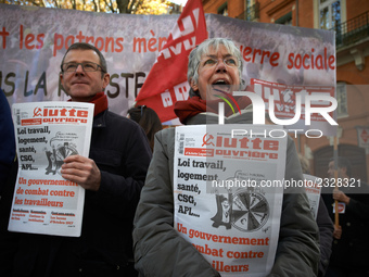 People selling far-left newspapers during the demonstration. More than 4000 protesters took to the streets of Toulouse against the new Macro...