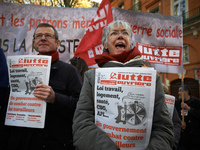 People selling far-left newspapers during the demonstration. More than 4000 protesters took to the streets of Toulouse against the new Macro...