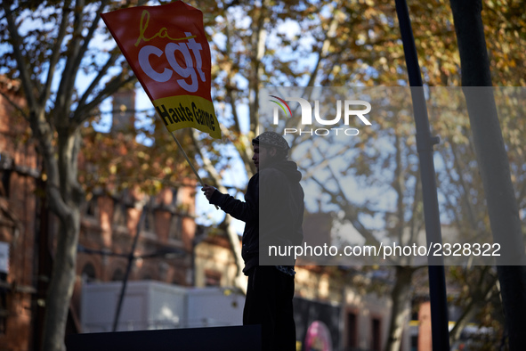 A man holds a flag of the CGT trade union. More than 4000 protesters took to the streets of Toulouse against the new Macron's reforms on the...