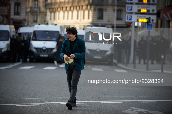 A clown plays in front of riot police. More than 4000 protesters took to the streets of Toulouse against the new Macron's reforms on the Wor...