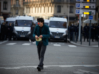 A clown plays in front of riot police. More than 4000 protesters took to the streets of Toulouse against the new Macron's reforms on the Wor...