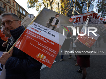 Protesters hold posters depicting a priest and reading 'him, he's compelling to work on sundays. You, you are not !'. More than 4000 protest...