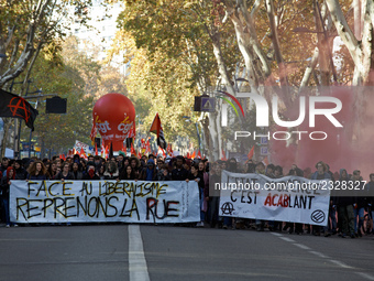 Protesters hold a banner reading 'Against Liberalism, Let's take us the streets'. More than 4000 protesters took to the streets of Toulouse...