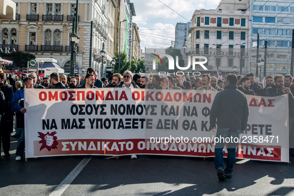 Protesters from the communist labour union PAME take part in a demonstration against changes to laws about calling strikes in Athens, Greece...