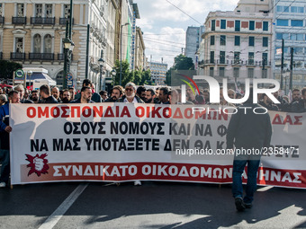 Protesters from the communist labour union PAME take part in a demonstration against changes to laws about calling strikes in Athens, Greece...