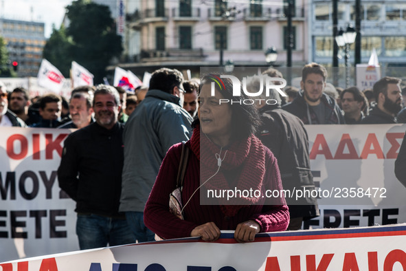 Protesters from the communist labour union PAME take part in a demonstration against changes to laws about calling strikes in Athens, Greece...