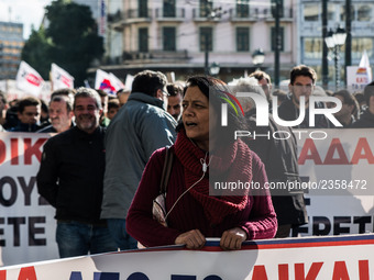 Protesters from the communist labour union PAME take part in a demonstration against changes to laws about calling strikes in Athens, Greece...