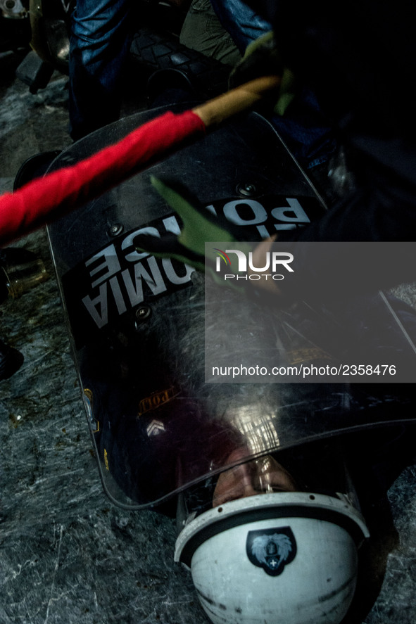 Members of the Greek Communist labour union PAME clash with riot police after storming the Greek labour ministry during a demonstration agai...