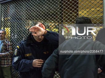 An injured riot police officer after the communist labour union PAME storming the Labour Ministry during a demonstration against changes to...