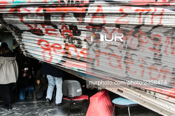 The damaged entrance of the Labour Ministry is seen, after protesters from the Greek Communist labour union stormed in during a demonstratio...