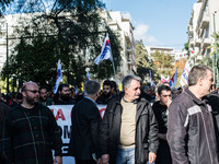 Demonstrators of  the Greek Communist labour union (PAME) protesting the amendment provides that for declaring a strike required to conform...