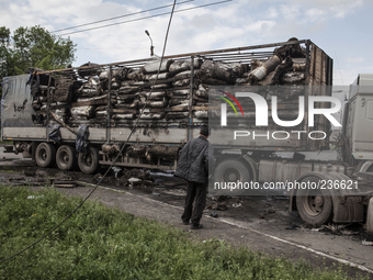 A truck hit by Ukrainian artillery (