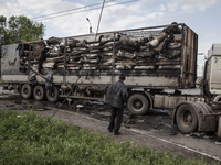 A truck hit by Ukrainian artillery (