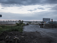 explosions of mortar near a pro-Russian checkpoint (