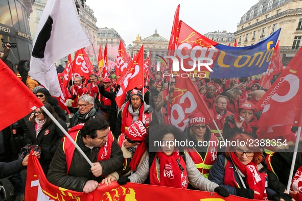 French General Confederation of Labour (CGT) unionists gather in front of Paris' Opera Garnier on December 20, 2017, to protest against Fren...