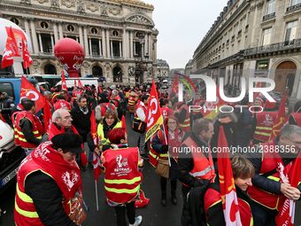 French General Confederation of Labour (CGT) unionists gather in front of Paris' Opera Garnier on December 20, 2017, to protest against Fren...