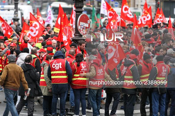 French General Confederation of Labour (CGT) unionists gather in front of Paris' Opera Garnier on December 20, 2017, to protest against Fren...