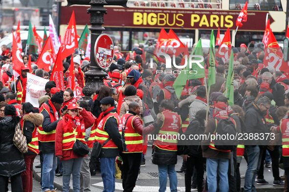 French General Confederation of Labour (CGT) unionists gather in front of Paris' Opera Garnier on December 20, 2017, to protest against Fren...