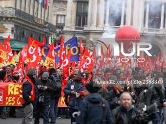 French General Confederation of Labour (CGT) unionists gather in front of Paris' Opera Garnier on December 20, 2017, to protest against Fren...