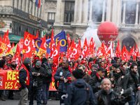 French General Confederation of Labour (CGT) unionists gather in front of Paris' Opera Garnier on December 20, 2017, to protest against Fren...