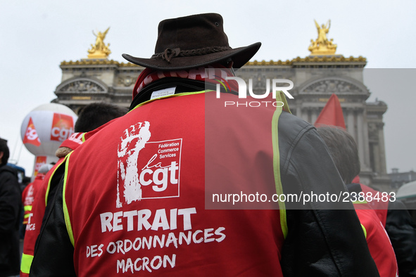 French General Confederation of Labour (CGT) unionists gather in front of Paris' Opera Garnier on December 20, 2017, to protest against Fren...