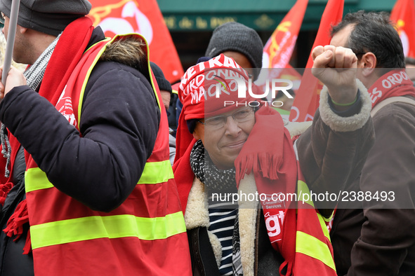 French General Confederation of Labour (CGT) unionists gather in front of Paris' Opera Garnier on December 20, 2017, to protest against Fren...