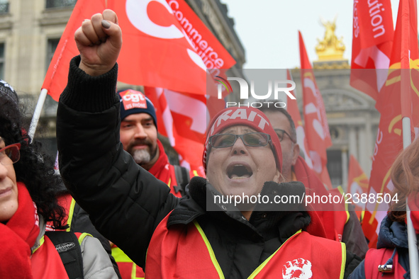 French General Confederation of Labour (CGT) unionists gather in front of Paris' Opera Garnier on December 20, 2017, to protest against Fren...