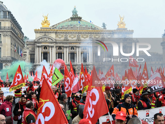 French General Confederation of Labour (CGT) unionists gather in front of Paris' Opera Garnier on December 20, 2017, to protest against Fren...