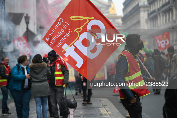 People marched through the streets of Paris during a demonstration called by French General Confederation of Labour (CGT) union on December...