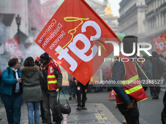 People marched through the streets of Paris during a demonstration called by French General Confederation of Labour (CGT) union on December...