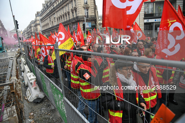 People marched through the streets of Paris during a demonstration called by French General Confederation of Labour (CGT) union on December...