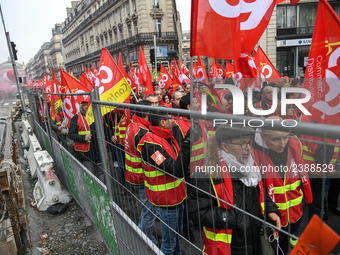 People marched through the streets of Paris during a demonstration called by French General Confederation of Labour (CGT) union on December...