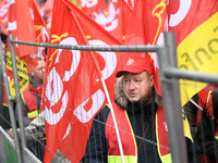 People marched through the streets of Paris during a demonstration called by French General Confederation of Labour (CGT) union on December...