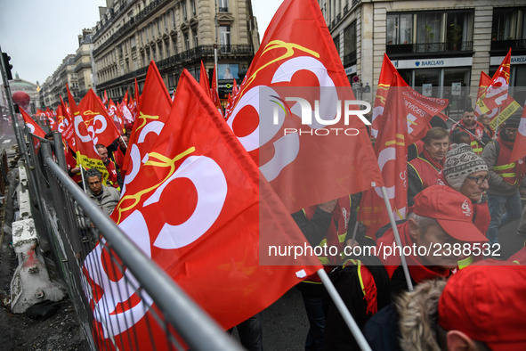 People marched through the streets of Paris during a demonstration called by French General Confederation of Labour (CGT) union on December...