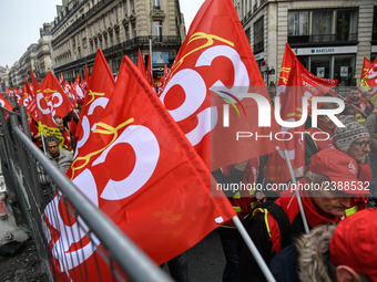 People marched through the streets of Paris during a demonstration called by French General Confederation of Labour (CGT) union on December...