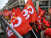 People marched through the streets of Paris during a demonstration called by French General Confederation of Labour (CGT) union on December...