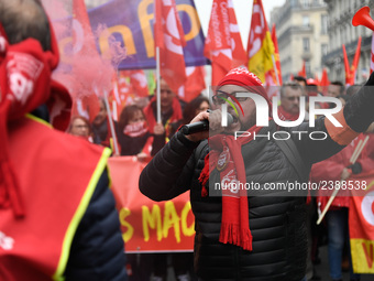 People marched through the streets of Paris during a demonstration called by French General Confederation of Labour (CGT) union on December...