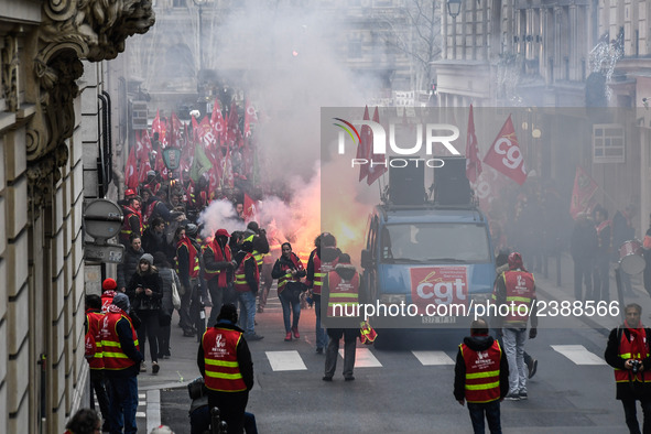 People marched through the streets of Paris during a demonstration called by French General Confederation of Labour (CGT) union on December...