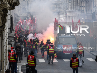 People marched through the streets of Paris during a demonstration called by French General Confederation of Labour (CGT) union on December...