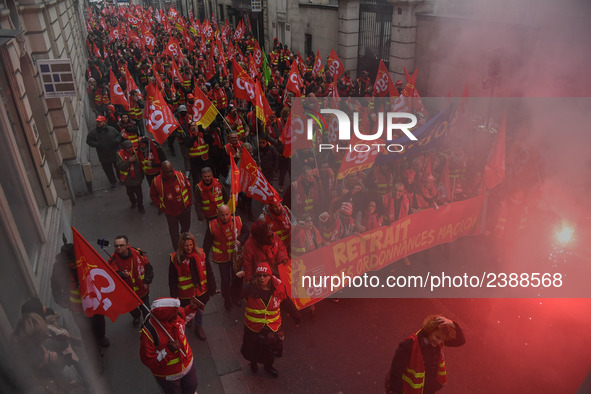 People during a demonstration called by French General Confederation of Labour (CGT) union on December 20, 2017 in Paris to protest against...