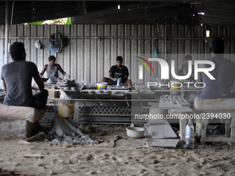 A pottery maker produces a clay lantern or ‘diya’ in Kuala Selangor, Malaysia. Diyas are the small earthen lamps primarily used during Diwal...