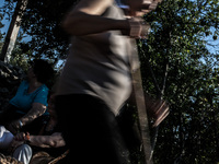 Pilgrims on a steep path that leads on the very place of the apparitions of Our Lady,  called Podbrdo and Apparition Hill. Almost one millio...