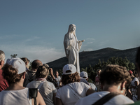 Statue of Virgin Mary on the the Apparition Hill, in Medjugorie. Almost one million people visit Medjugorje each year, where the Virgin Mary...