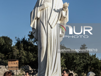 A statue of Virgin Mary on the the Apparition Hill, in Medjugorie. Almost one million people visit Medjugorje each year, where the Virgin Ma...