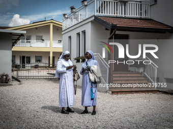 Two nuns near the church of congregation “Wounded Families” founded after the war by Sr Josipa and Sr Kornelia Kordic, in Medjugorje. Almost...