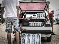 A man show on his car the Virgin Mary statues, rosaries, crucifixes for sell to tourist in Medjugorje. Almost one million people visit Medju...