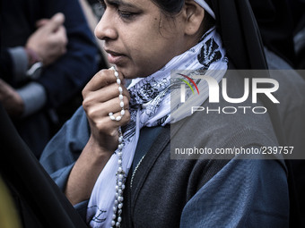 A nun prays during the apparition of Virgin Mary to Mirjana, on September 2, 2014. It was to Mirjana that Our Lady first entrusted all 10 se...